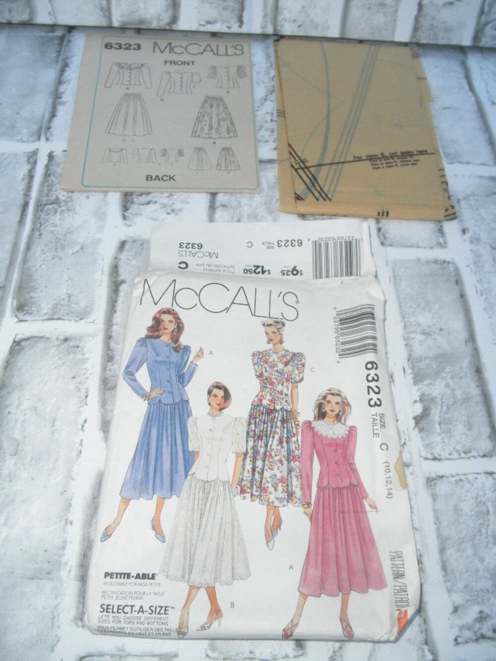 #6323 PRE-OWNED MCCALL'S UNCUT SEWING PATTERN MISSES (2PC) DRESS (SIZE 10-12-14